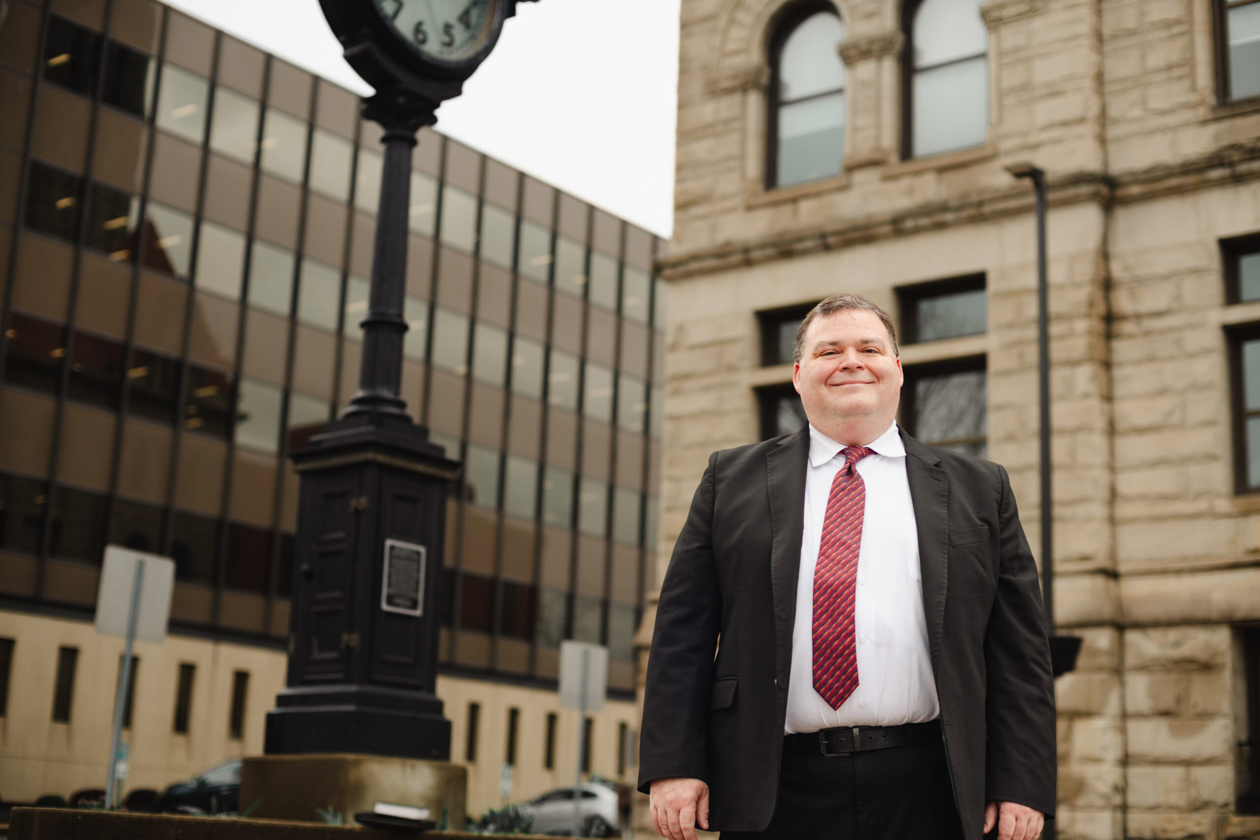Attorney Travis Sayre of Sayre Law Services standing outside the Wood County Courthouse in Parkersburg, West Virginia